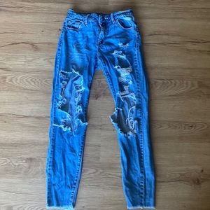 FASHION NOVA RIPPED JEANS SIZE 0 WOMEN’S